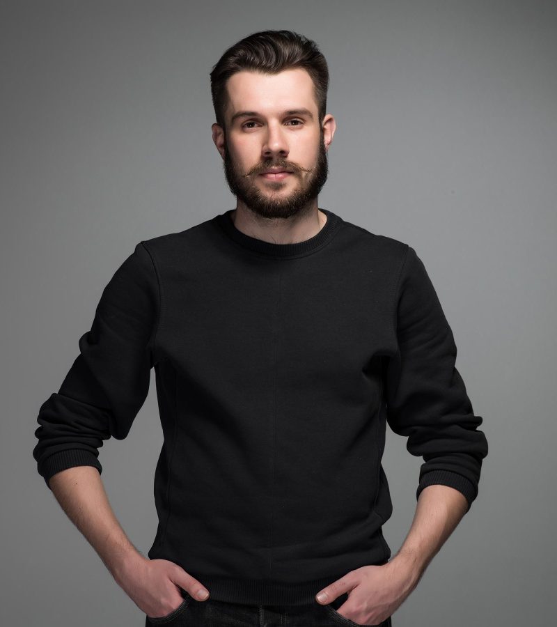 fashion-portrait-of-young-man-in-black-PRRGJWK.jpg